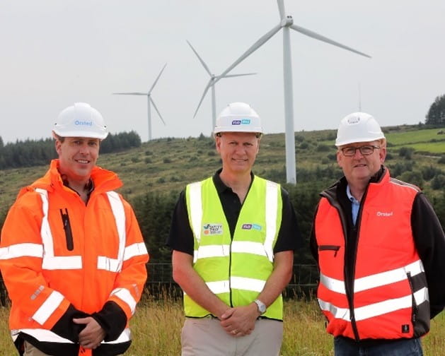 Flogas & Ørsted announce a new strategic partnership through an innovative Corporate Power Purchase Agreement (CPPA), delivering renewable electricity from Knockawarriga Wind Farm in Co. Limerick to over 20 medium and large Irish businesses. (L-R) TJ Hunter, Vice President Onshore Ireland UK, Ørsted John Rooney, Managing Director at Flogas Ireland and Gary Howarth, Regional Supervisor Onshore Ireland UK, Ørsted Photographed by: : Brendan Gleeson Photography