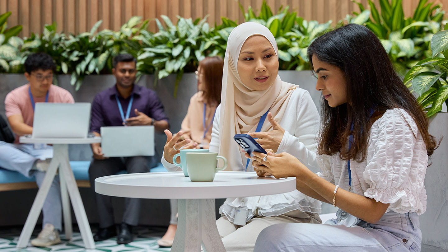 employees sitting in the shared space