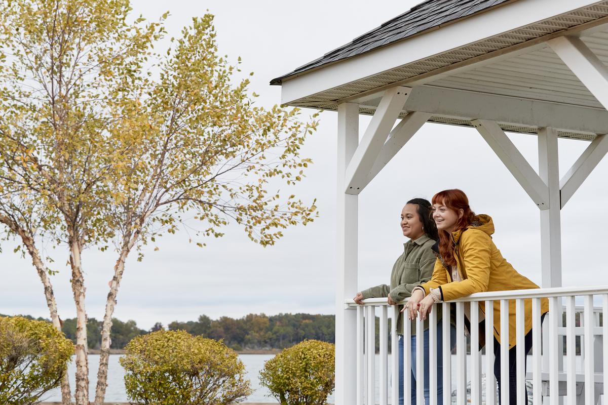 Two people on a porch