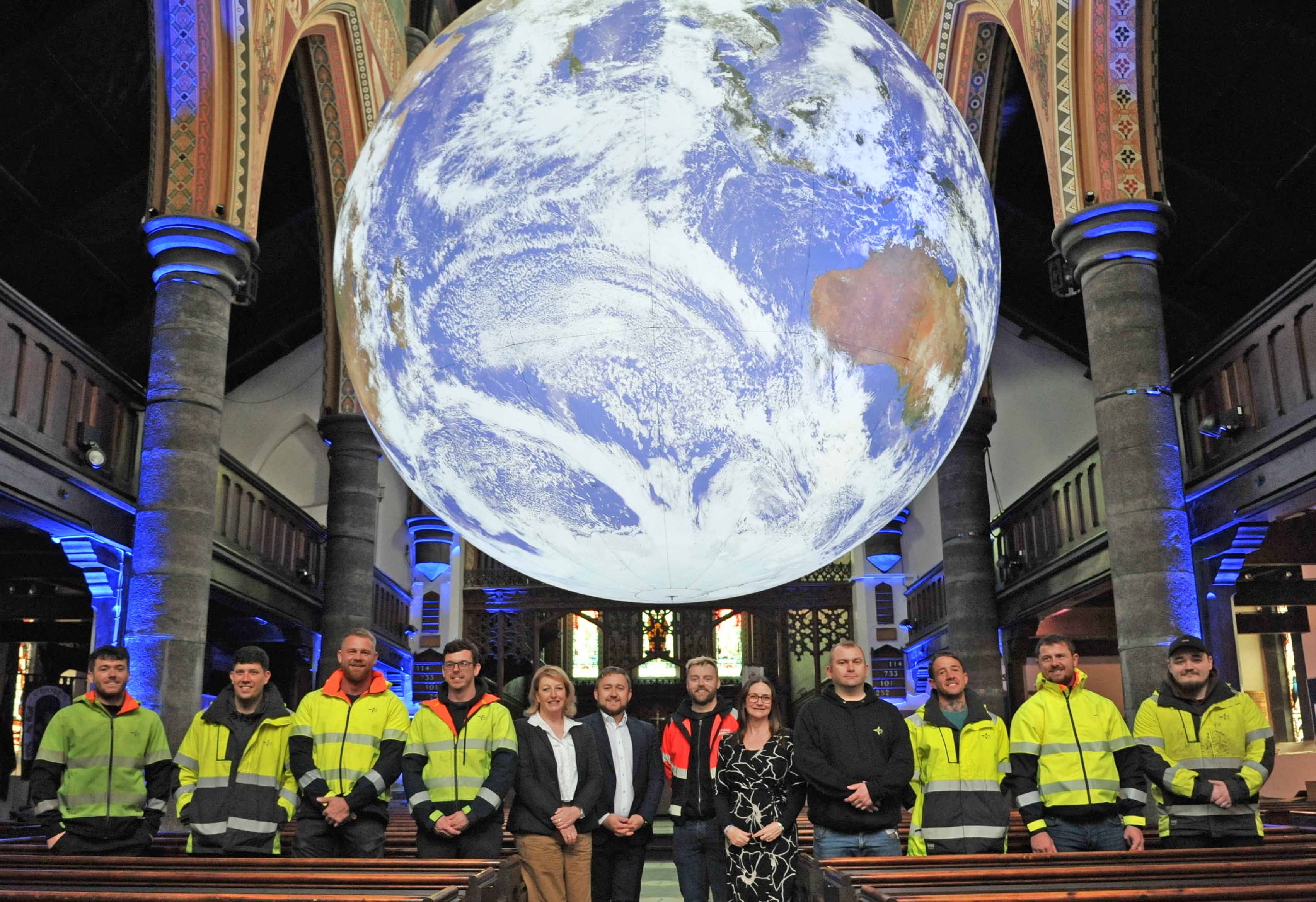 Image shows large globe suspended inside St Thomas' Church, Douglas as part of the Gaia Art Exhibition.