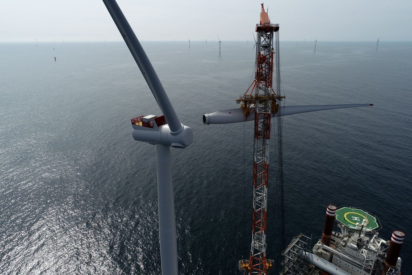 Image of an offshore wind turbine blade installation