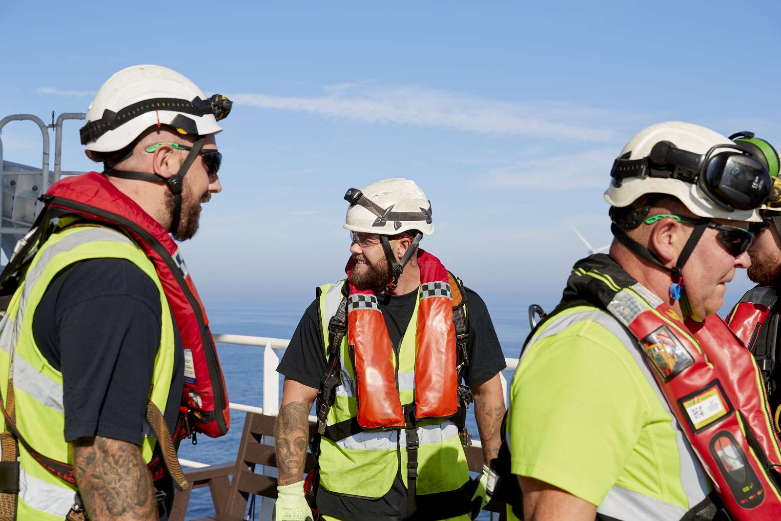 Offshore Wind Technicians out at sea on an service operation vessel