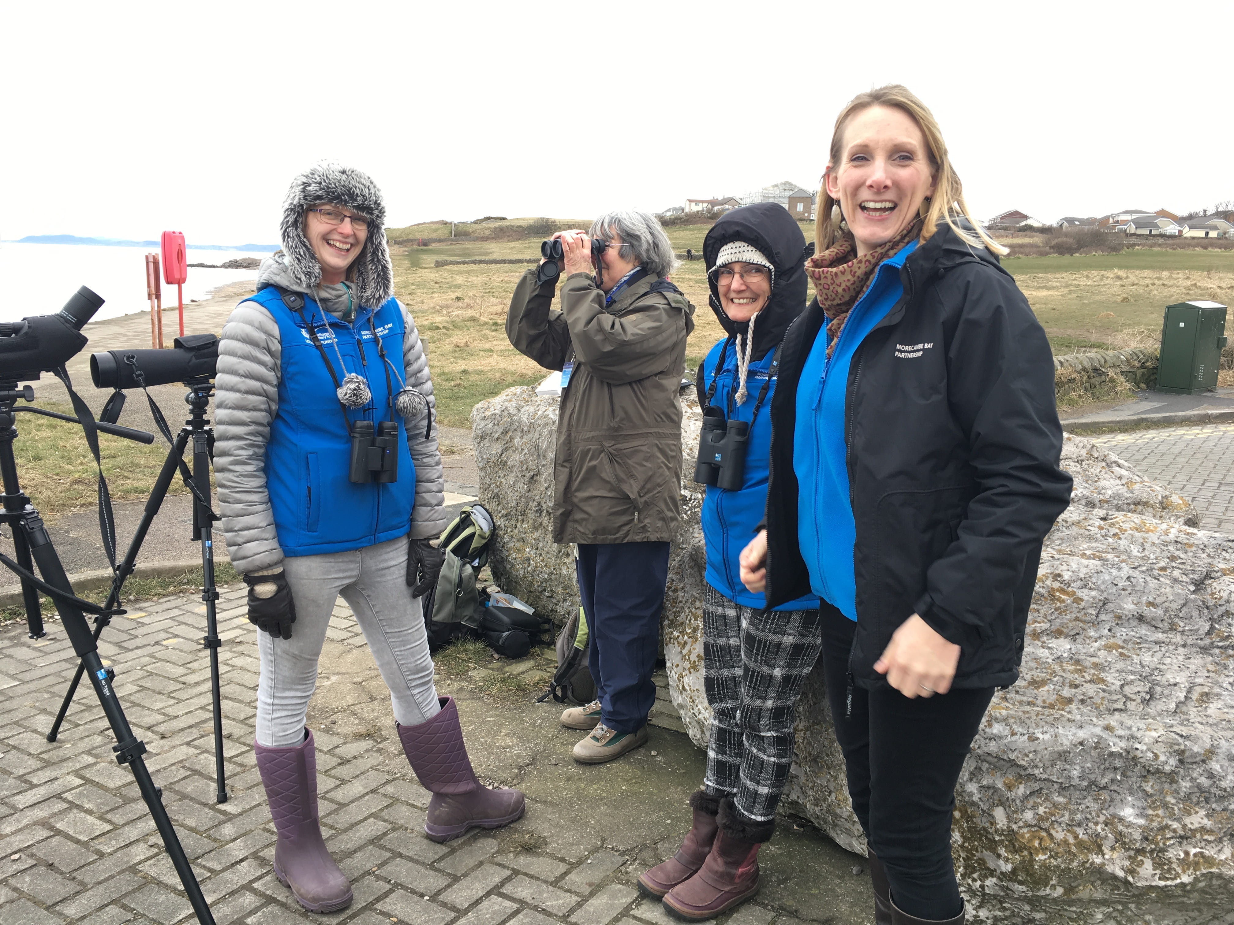 Natural Ambassadors showing people the Birds of the Bay. Credit: Morecambe Bay Partnership