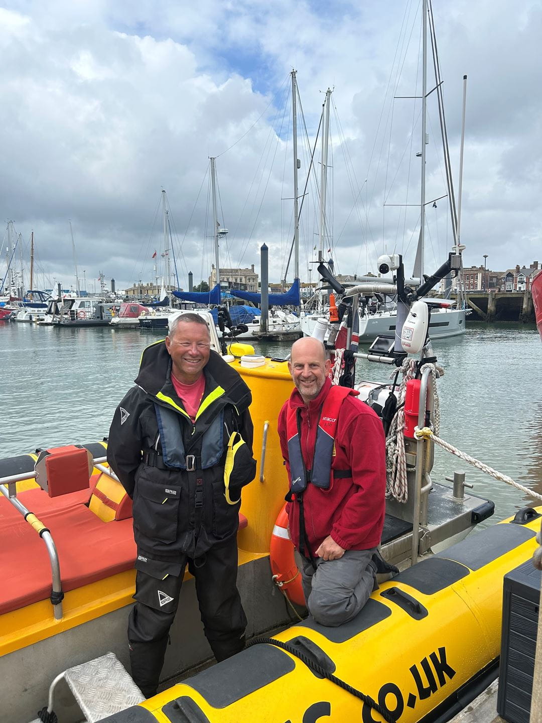 John Kitching (owner) and Mark Crame (crew) of Jet Adventures at Lowestoft Harbour