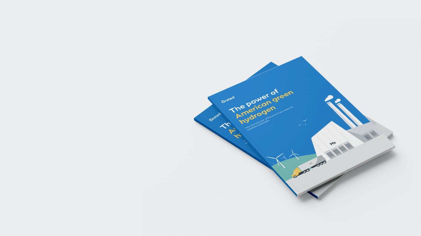 Two stacked copies of Ørsted's 'The Power of American Green Hydrogen' white paper, showing a Power-to-X (P2X) facility.