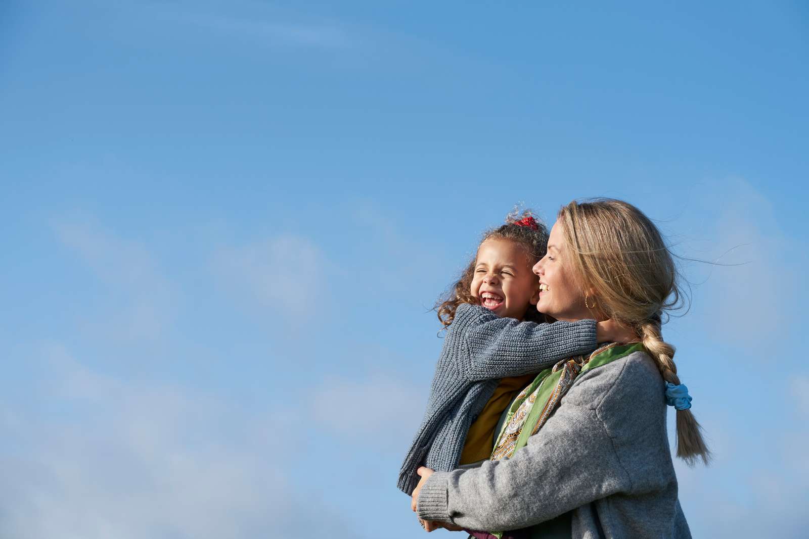 Woman with a child smiling