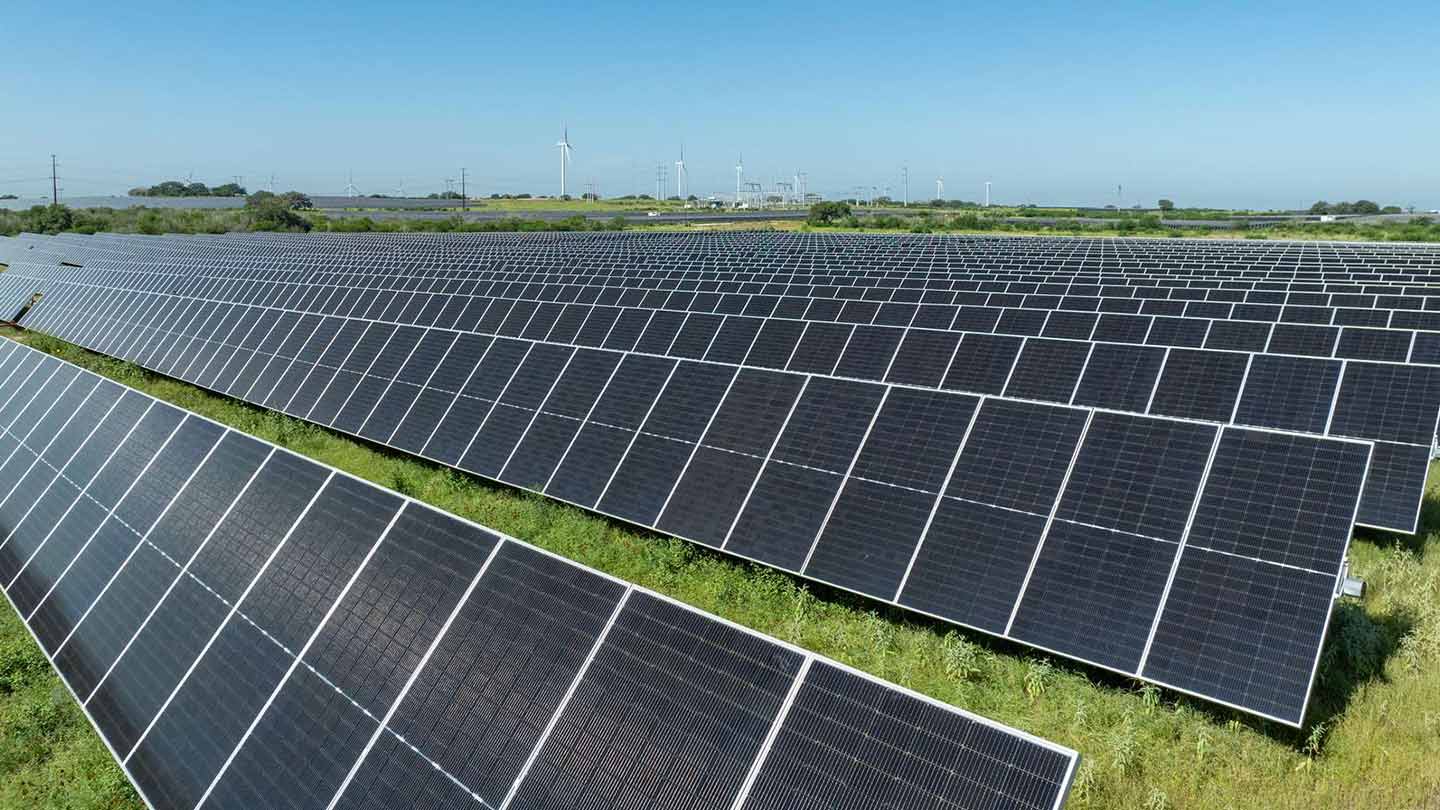 A row of black solar panels from one of Ørsted's solar and storage projects, delivering reliable energy to the U.S. grid.